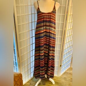 TYSA 100 % silk sexy dress. Longer in back. Adjustable straps. Gorgeous colors.